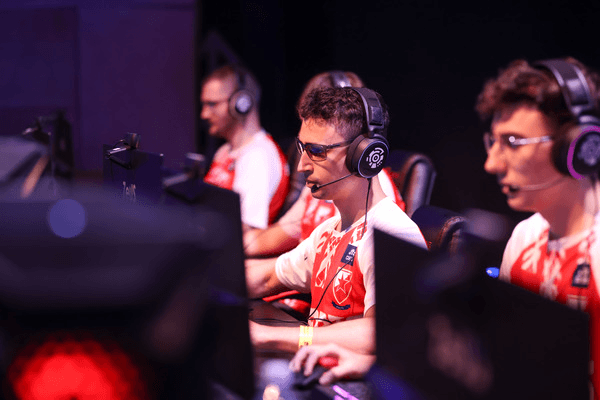 6ax, a professional League of Legends coach, competing with his team at an esports tournament.